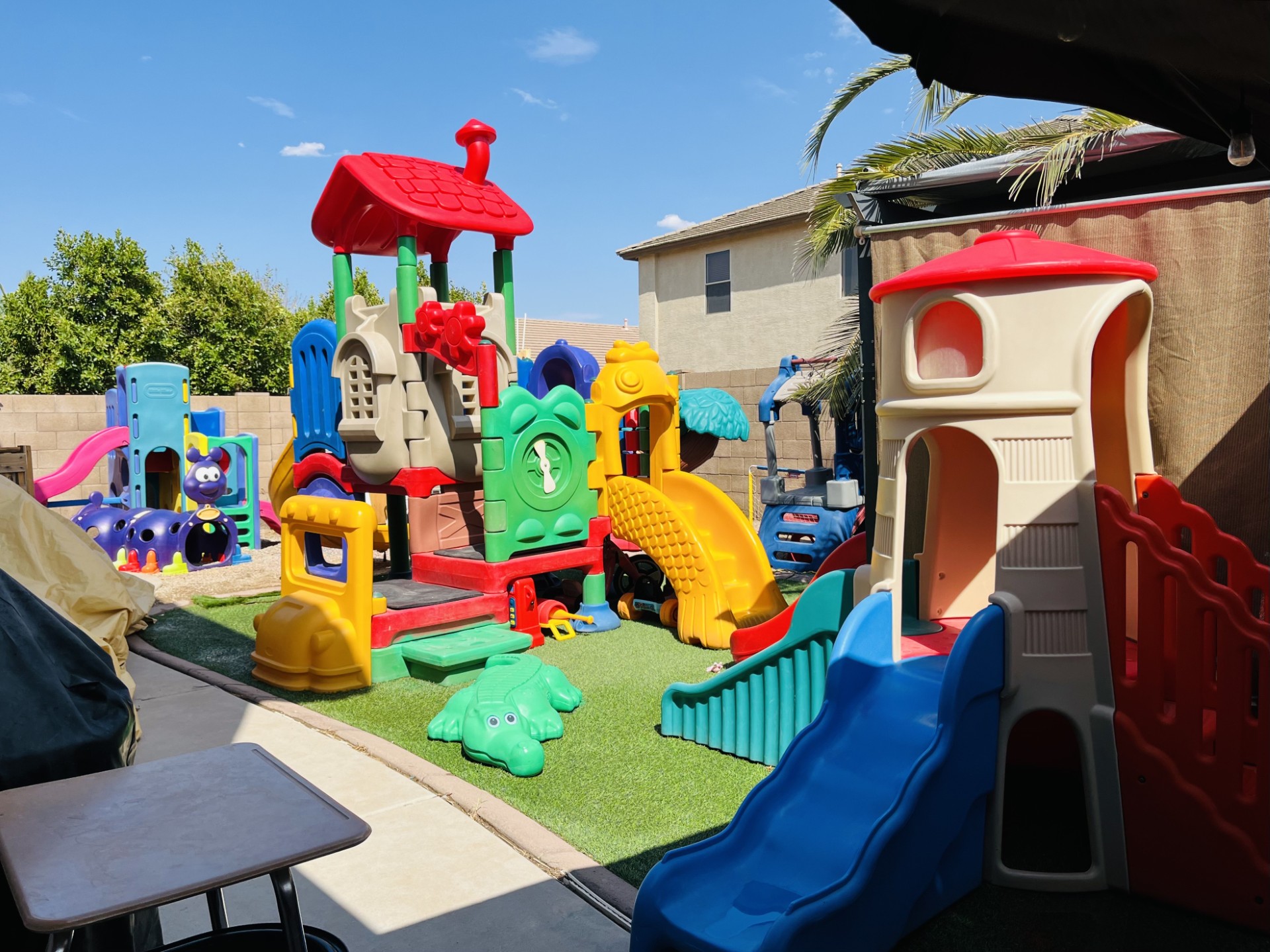 Children enjoy outdoor time in the fenced backyard at Eden Brooks Childcare, where safety and supervised play come first.