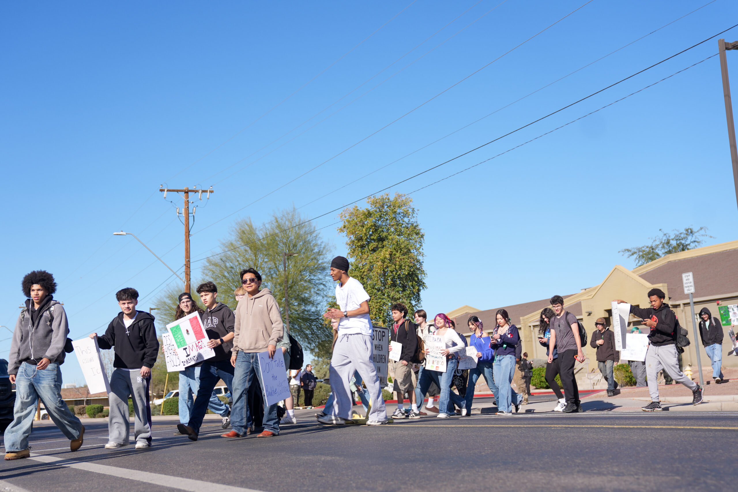 ‘We’re not afraid’: Hundreds of students walk out, march against ICE