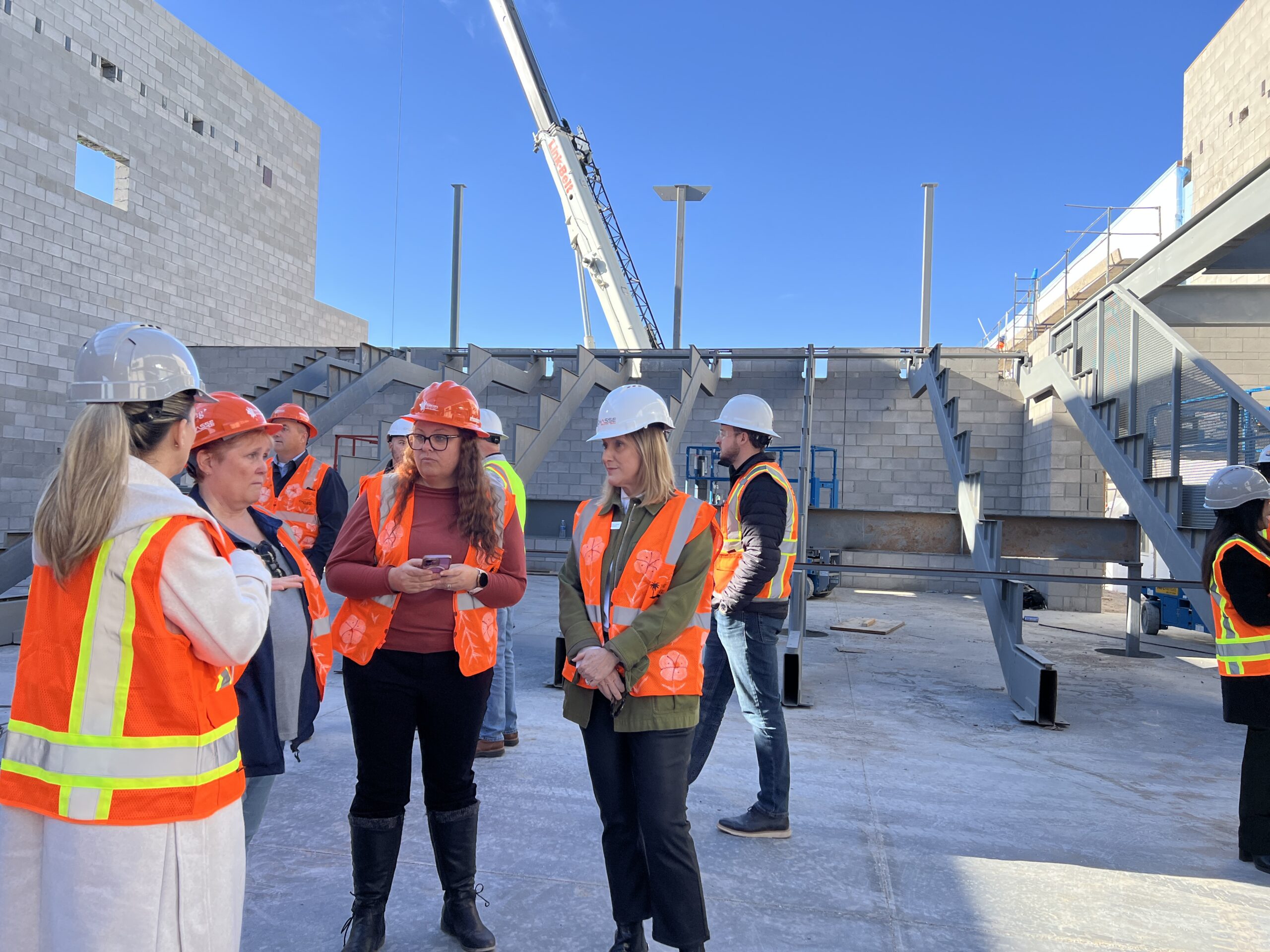 Grace Design partner speaking about the space with President Patti Couture Principal Allison and Dr. Tracey Lopeman