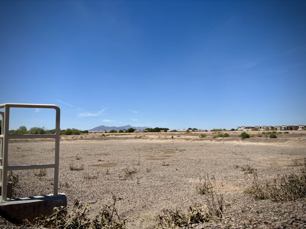 A vacant site near Porter Road and Sonoran Desert Parkway in Maricopa is proposed for an eight-building light-industrial park. April 21, 2026. [Elias Weiss]