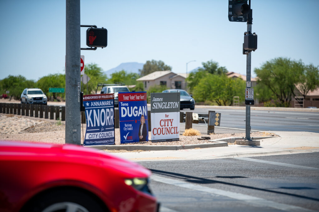 A trio of campaign signs sit on the southeastern corner of John Wayne Parkway and Bowlin Road on May 21, 2026. [Monica D. Spencer]