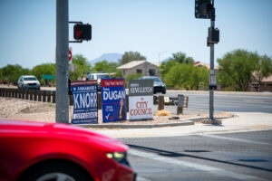 A trio of campaign signs sit on the southeastern corner of John Wayne Parkway and Bowlin Road on May 21, 2026. [Monica D. Spencer]