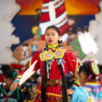 A dancer dressed in jingle dress regalia, dances during Maricopa Elementary School PTO's inaugural social powwow on May 2, 2026. [Monica D. Spencer]