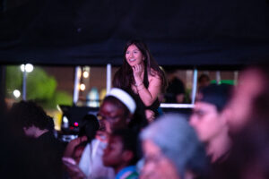 A woman sits on someone's shoulders during Soulja Boy's performance at Wild West Music Fest on March 29, 2026. [Monica D. Spencer]