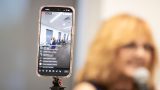 A Facebook livestream broadcasts city council candidate Tena Dugan at InMaricopa's city council candidate forum at Maricopa Library and Cultural Center on June 25, 2026. [Ryan Tafoya]