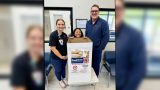 Dr. Brad Green, right, stands with staff members at Exceptional Community Hospital behind a food donation box inside the hospital. A food drive is being held through September 2026 to collect food and donations for Maricopa Pantry, [Submitted]
