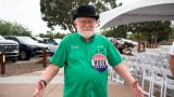 Councilmember Bob Marsh wears a large voting button during a ribbon cutting ceremony on Oct. 10, 2026. [Monica D. Spencer]