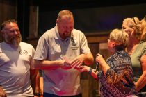 Veterans in Need Board Member Justin Price accepts a donation check from Maricopa Moose and Duke's Roadhouse on Oct. 19, 2026. [Monica D. Spencer]