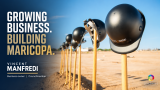 Black construction helmets resting on gold shovels beside the words “Growing business. Building Maricopa.” and Vincent Manfredi’s name.
