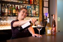 A server at Mandy's Wine Bar pours a glass of wine on Aug. 13, 2025. [Monica D. Spencer]