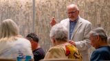 Councilmember Vincent Manfredi speaks to a small crowd during a live town hall he hosted at Maricopa City Hall on Aug. 28, 2025. [Monica D. Spencer]