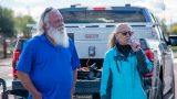 Maricopa Pantry co-founders Jim and Alice Shoaf speak to a small crowd at the food bank's groundbreaking of its permanent location in Hidden Valley on Nov. 20, 2025. [Monica D. Spencer]
